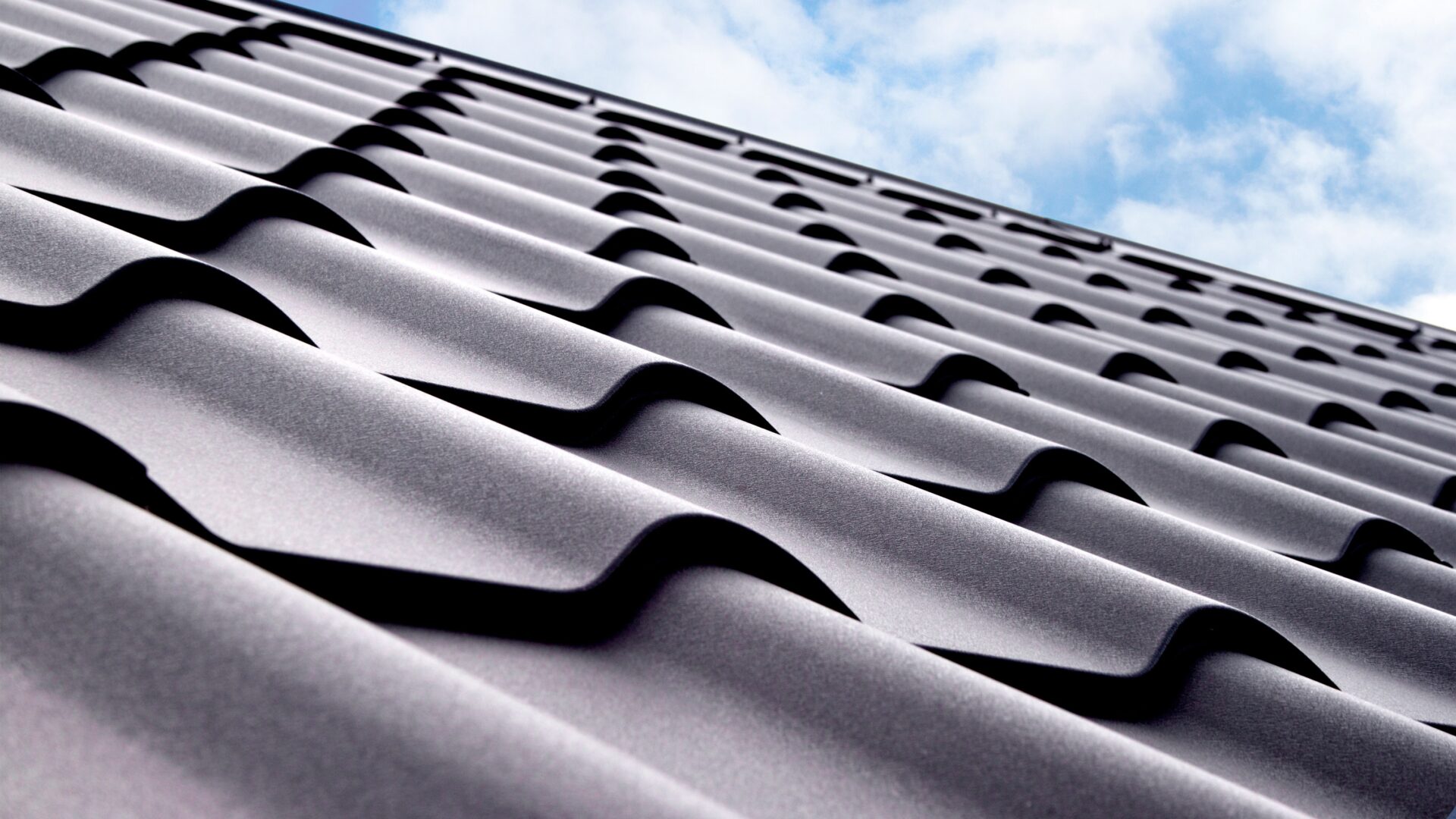 Closeup of black tile roofing